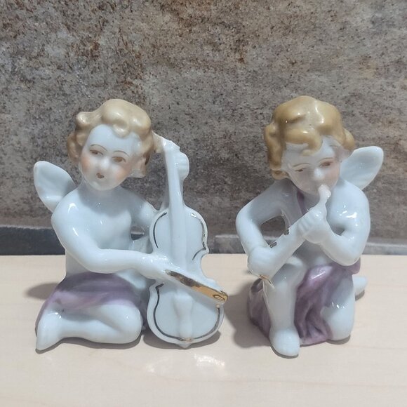 Two Vintage Porcelain Cherub Angel Figurines Playing Musical Instruments - Picture 1 of 11